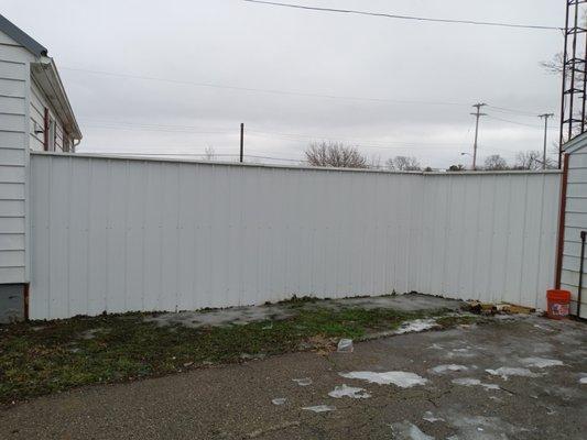 We installed a 7 and 1/2 ft privacy fence this is one of three sections