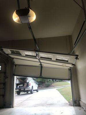 Single Garage door off track/ roller off track.