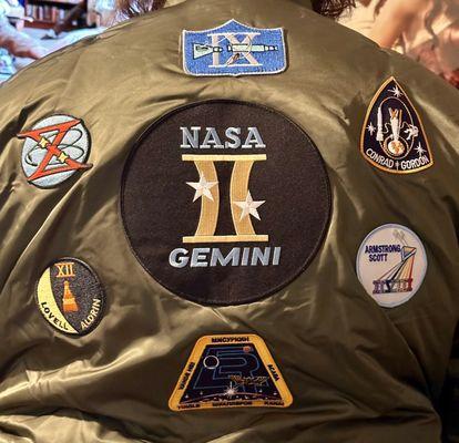 Back of hubby's jacket, Christmas Day. Gemini project patch, 5 1966 Gemini Mission patches, Soyuz MS-07  ISS mission patch