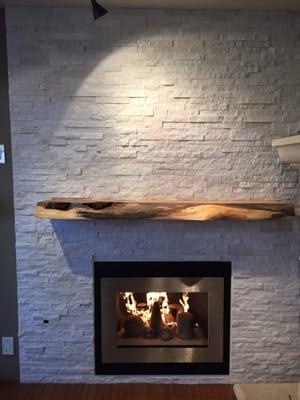 Custom door and floating mantle shelf.