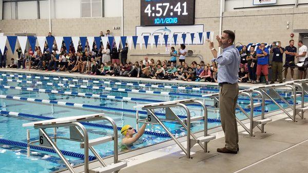 Coach Chris Plumb works with Olympic swimmer Kelsie Worrell demonstrating stroke drills for coaches & swimmers at the Eastern States Clinic.