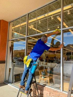 DSS cleans residential, retail, and commercial windows. This is team member Stu cleaning the windows at Downeast on Red Cliffs Dr.