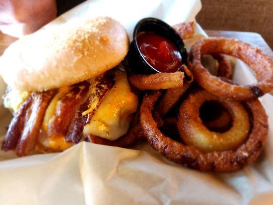 Triple cheese, bacon burger and onion rings!