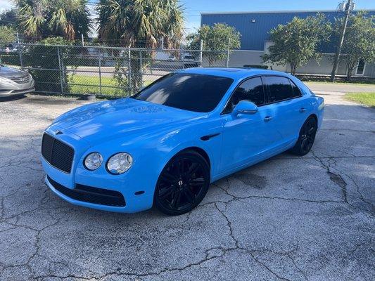 Left side damaged repaired then wrapped in baby blue  #2019 Bentley flying spur