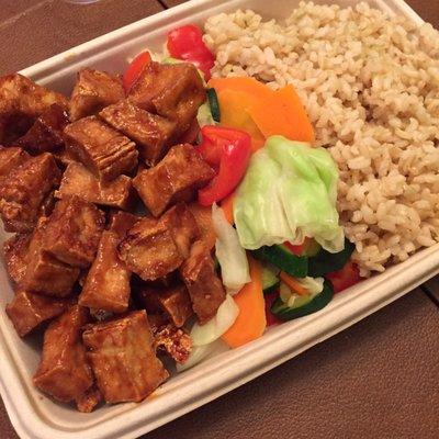 Teriyaki tofu with veggies & brown rice. Perfect quick dinner