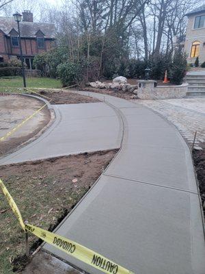 Sidewalk and apron completed