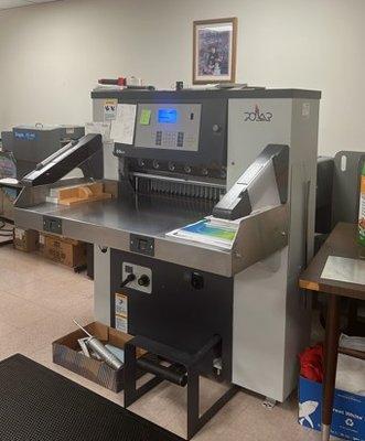 Hydraulic Paper Cutter relocated by A&A Transfer.