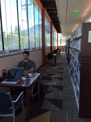 Workspaces with four power outlets on each table and free wifi; this library has it all.