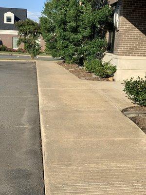 Sidewalk pressure washing- increase the curb appeal of your business