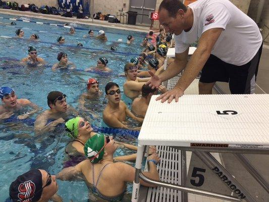 Olympic medalist Jason Lezak works with swimmers from the Eastern States Clinic hosted by the NL Aquatic Center.