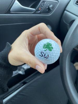 The owner's initials of the golf ball that hit my windshield.