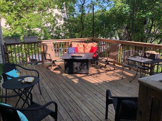 Upper deck/patio with fire pit, plenty of seating and even heaters and blankets for chilly nights.