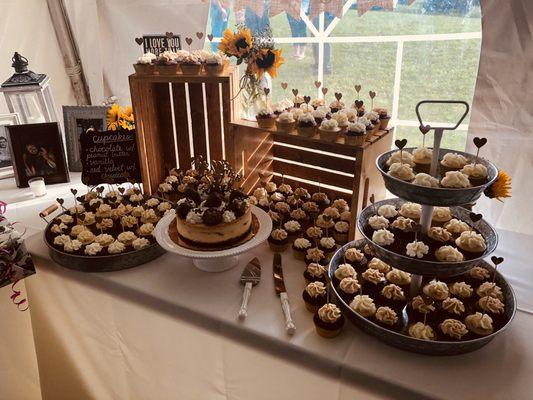 Cupcakes and cheesecake wedding set up