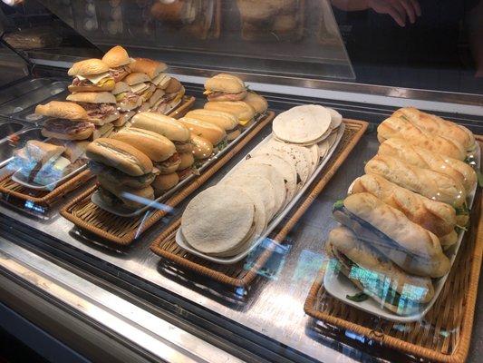 Sandwiches are put in a panini press before serving