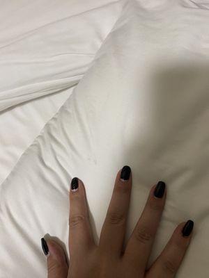 Small stain on pillow, between index and middle finger.