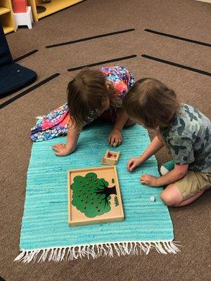 Zoe and Finn counting apples