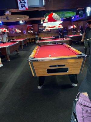 Pool tables, juke box, darts, and video games are part of the Huddle experience.