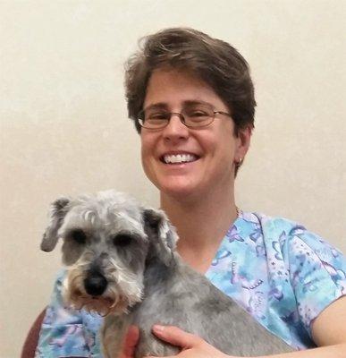 Dr. Laura Harrington with the office greeter, Pepper