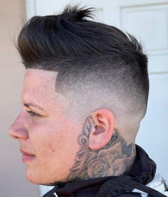 Trim on top with mid skin fade.