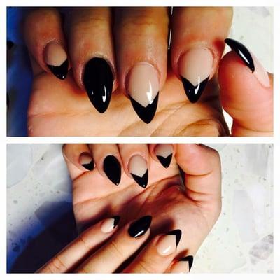 Gel black French tips with almond shape.