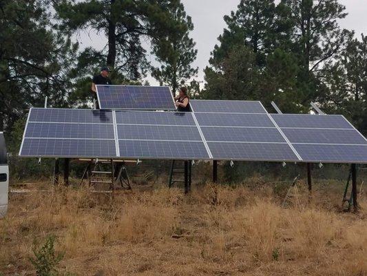 Installing off grid solar array.