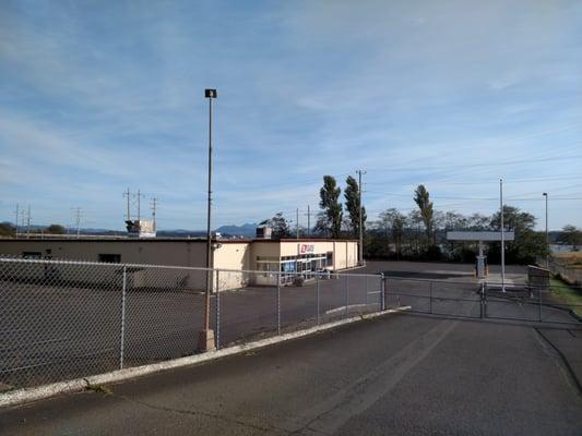 Main building and gas station.