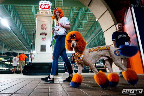 Then stylist and now salon owner Megan and her pup at Houston Astros Dog Day 2019. Her standard poodle Sheamus won most spirited.