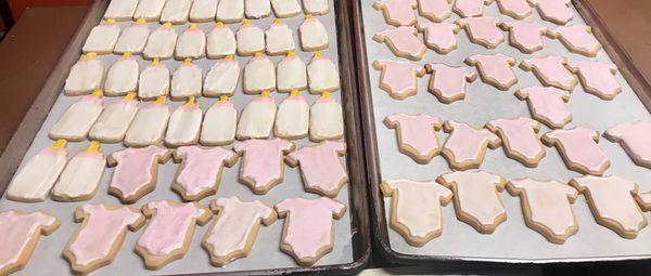 Frosted cookies for baby shower party favors.