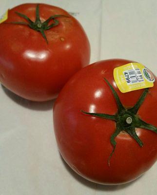 $2.49 per lb. tomatoes (yellow sticker) mixed in with expensive organic tomatoes(purple sticker)  Reprimanded for picking purple!