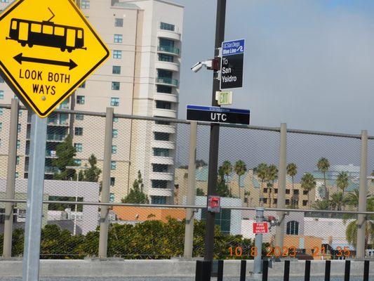 When you come to the UTC Station you do have the many signs that direct you to look both way moving trolleys stay behind the line.