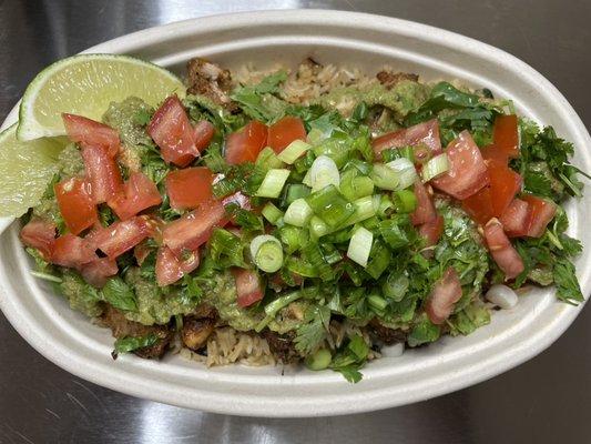 TWISTED LIME BOWL: Chicken enchilada cuisine comes with cilantro lime rice, chicken, verde salsa, and tomato's.