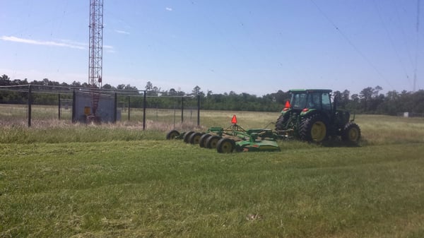 Industrial Tractor Mowing