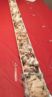 6' ice cream sunday served in a gutter. this was served during a party for our 5th- 8th graders