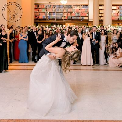 Wedding couple dances their first dance at the Boston Public Library after taking private wedding dance lessons at Boston Ballroom.