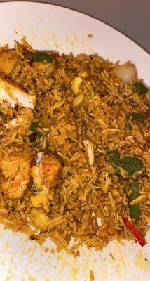 Chicken biryani with mint sauce.