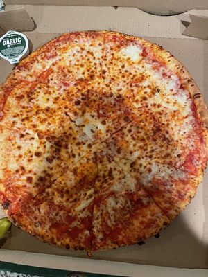 XL New York Pizza with some questionable pizza cutting.