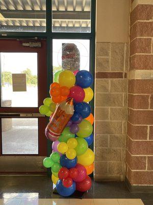 Balloon tower courtesy of The Poppy Shoppe for Austin ISD.