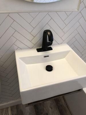 Floating wall mounted sink