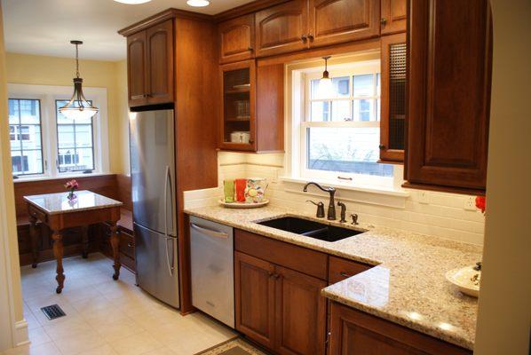 Custom built in seating in the nook really ties this whole kitchen together