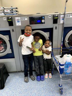 Kids help Mom for laundry.