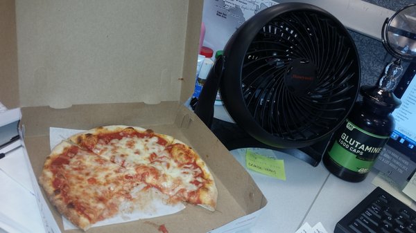 Personal sized pizza. 4 small slices. Cheese pie is $6.00. Size of the fan. Better off getting two slices.