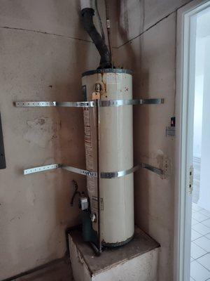 Double strapped water heater