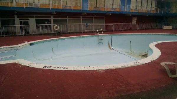 Empty pool in courtyard