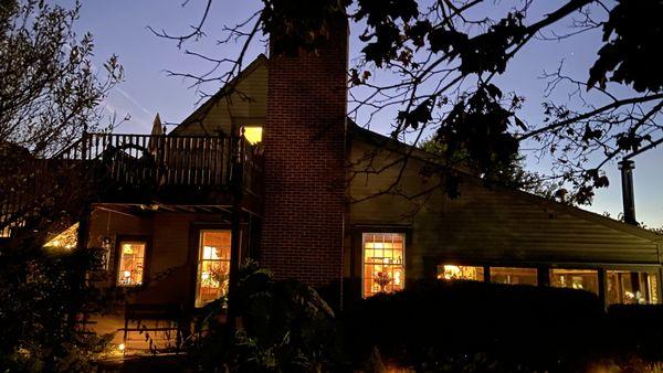 One of the Inn's many chimneys and decks at dusk.