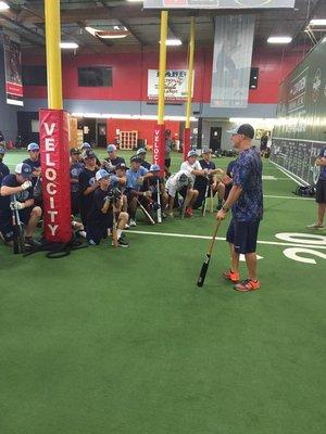 Ryan discussing hitting mechanics with Garciaparra Baseball Group.