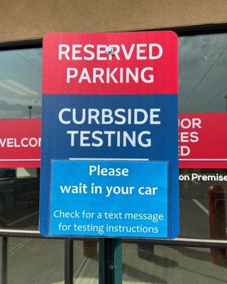 When arriving for a curbside COVID-19 testing, we ask you to please park in front of this sign and our staff will be right out.