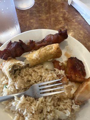 Old chicken on a stick, egg roll and "teriyaki" chicken