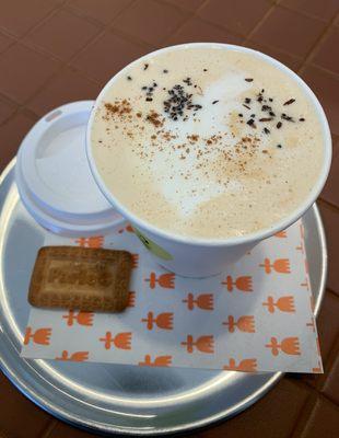 Chai, served with a Parle G cookie.