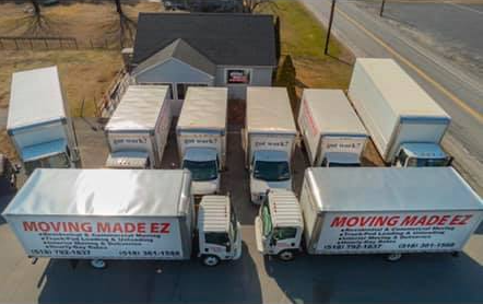 Business exterior with moving vans