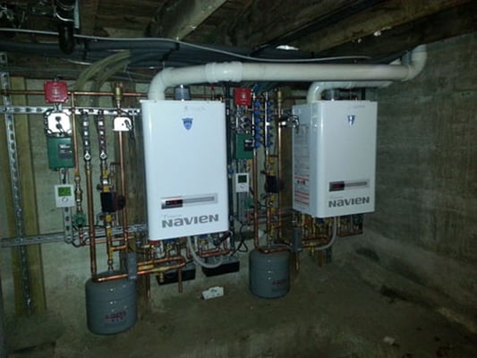 Tankless boiler water heater combo.